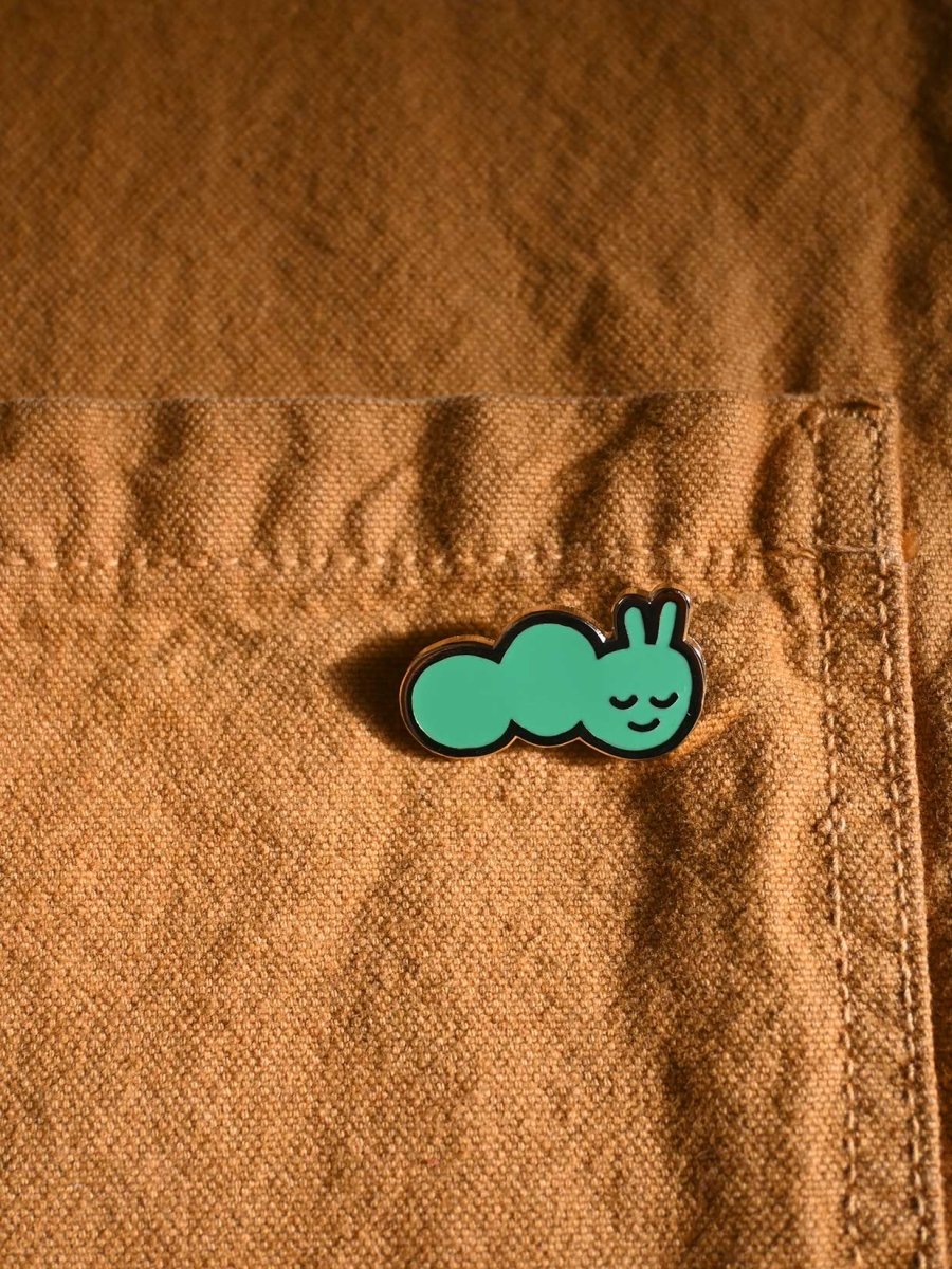 "Caterpillar" Enamel pin. Designed by HO HOS HOLE IN THE WALL (NYC)